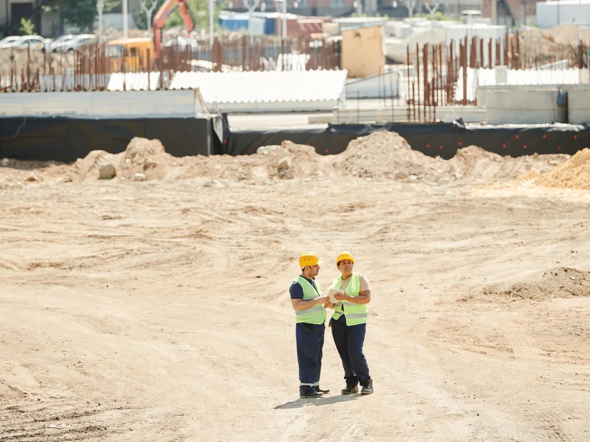 Construction company team reviewing job costing and accounting records