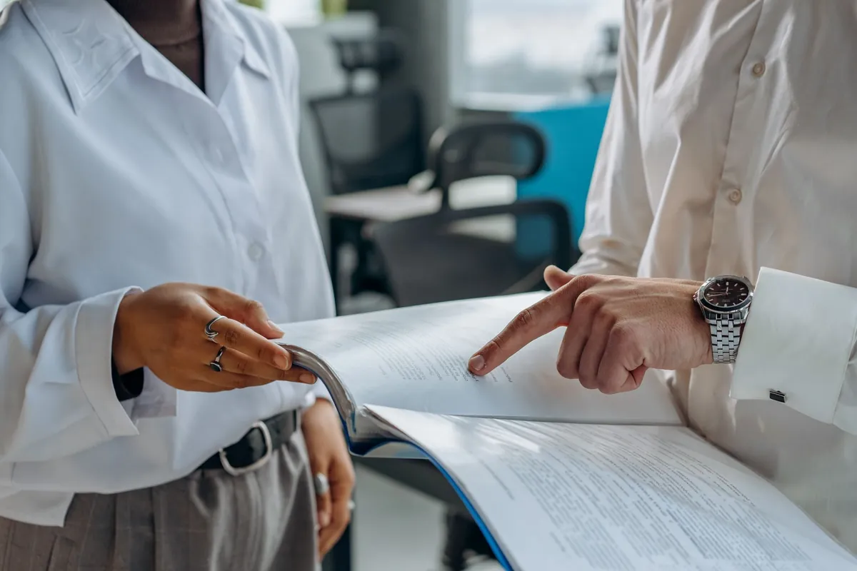 University accounting specialists reviewing fund accounting and financial reports