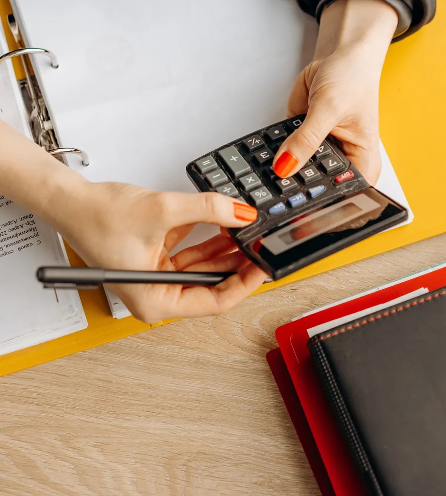 Boston bookkeeping professional reviewing business financial records