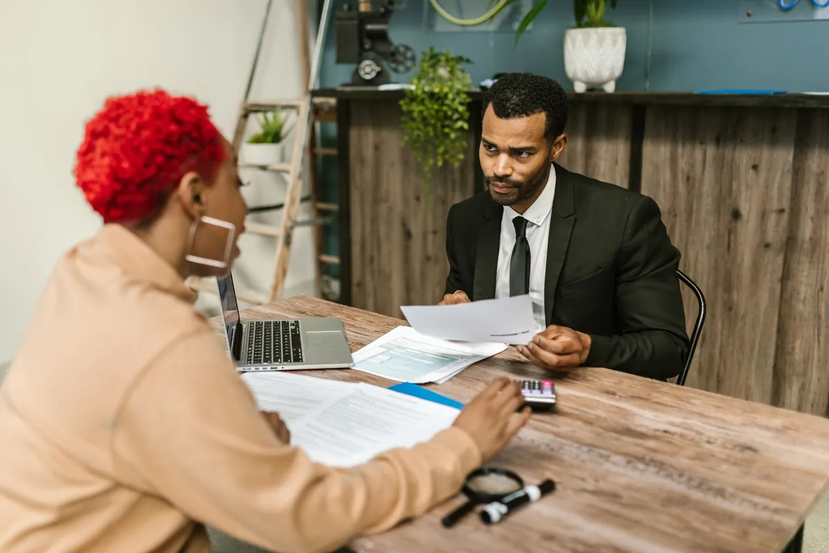 Independent contractor reviewing bookkeeping and financial reports