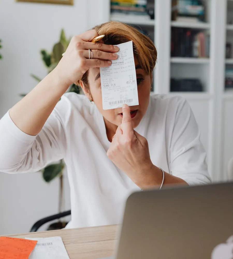 Dallas bookkeeping professional reviewing business financial records