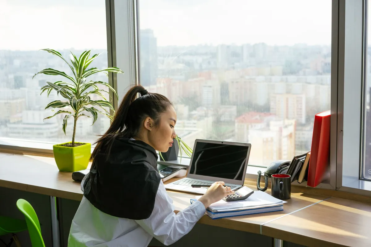 Dallas bookkeeping professionals reviewing financial reports