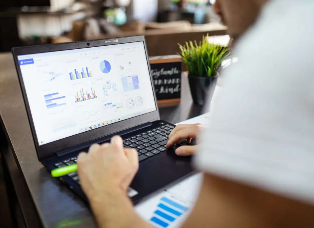 Denver business owners reviewing financial documents