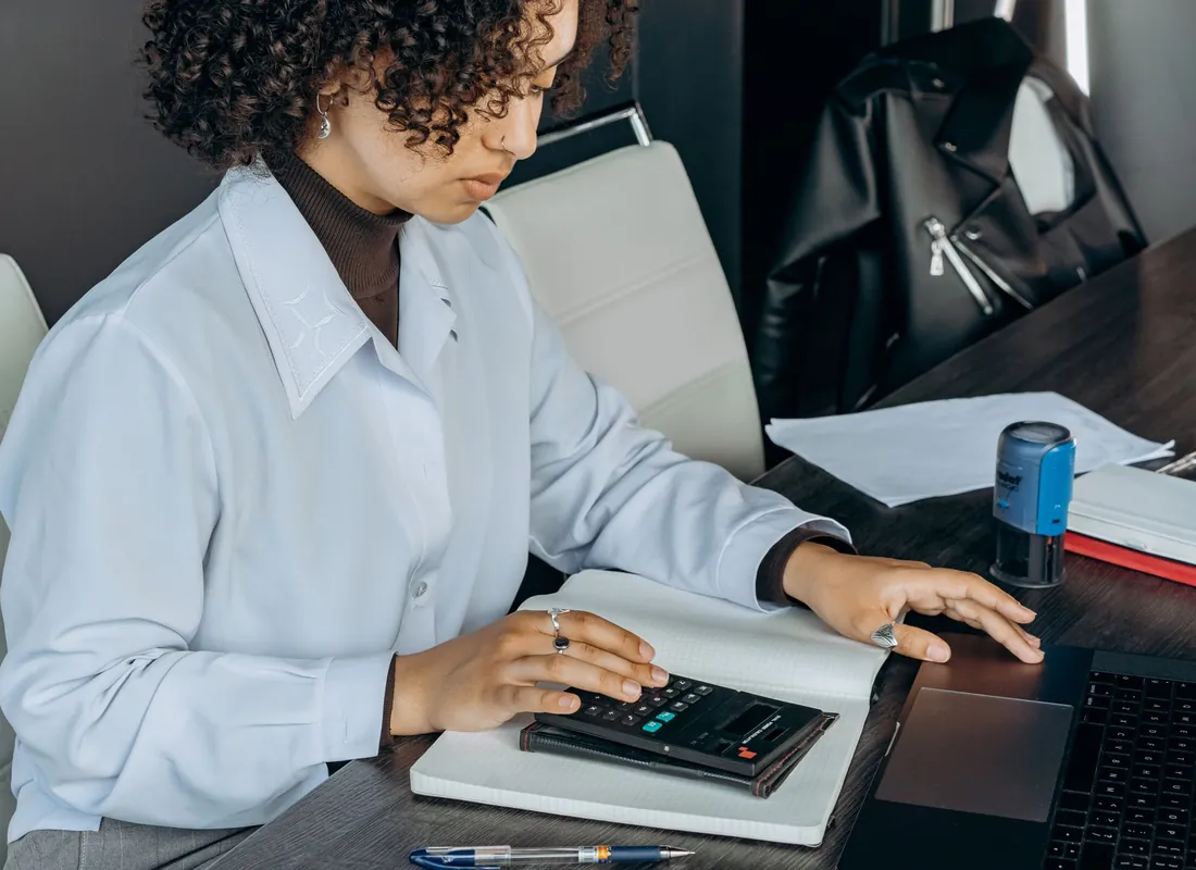 Doctors and practice administrators reviewing financial documents