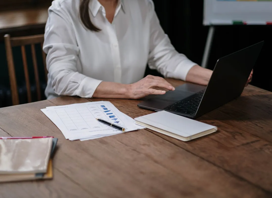 Dubai business owners reviewing financial documents together