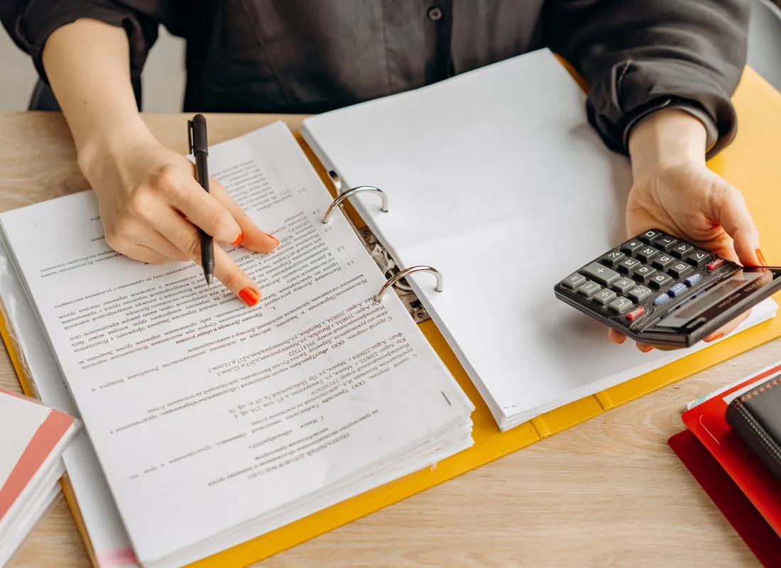 Franchise owners reviewing financial documents across locations