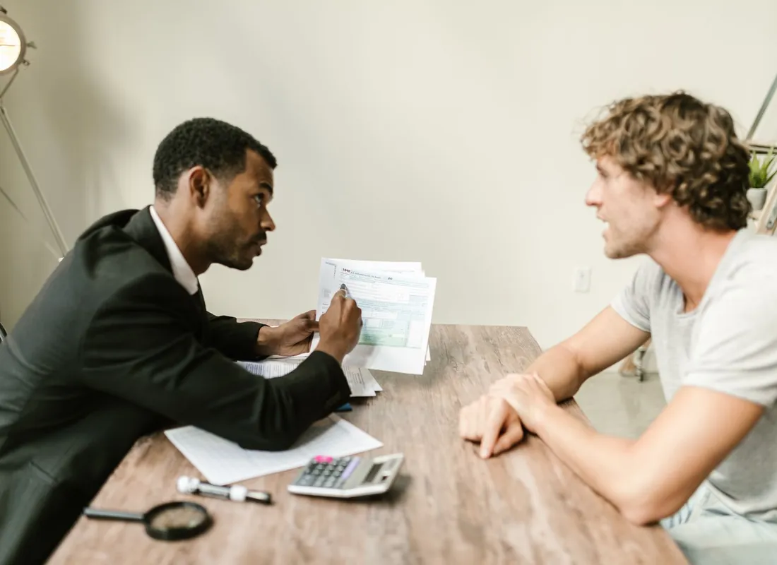 Houston business owners reviewing financial documents together