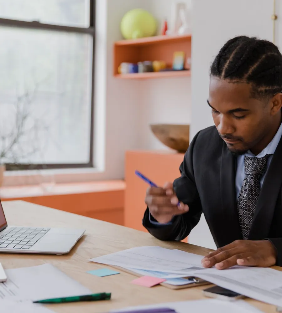 Legal professional reviewing bookkeeping and trust account records
