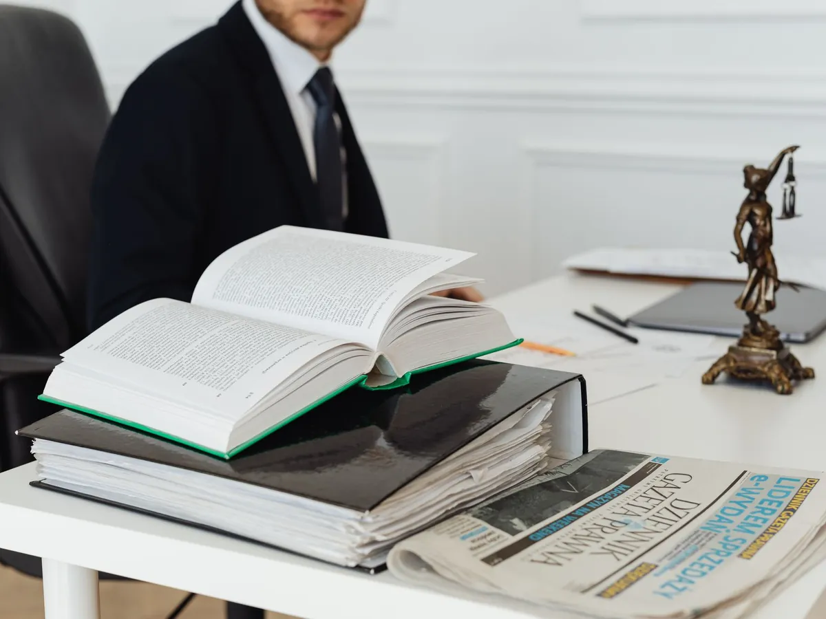 Law firm team reviewing legal bookkeeping and trust account records