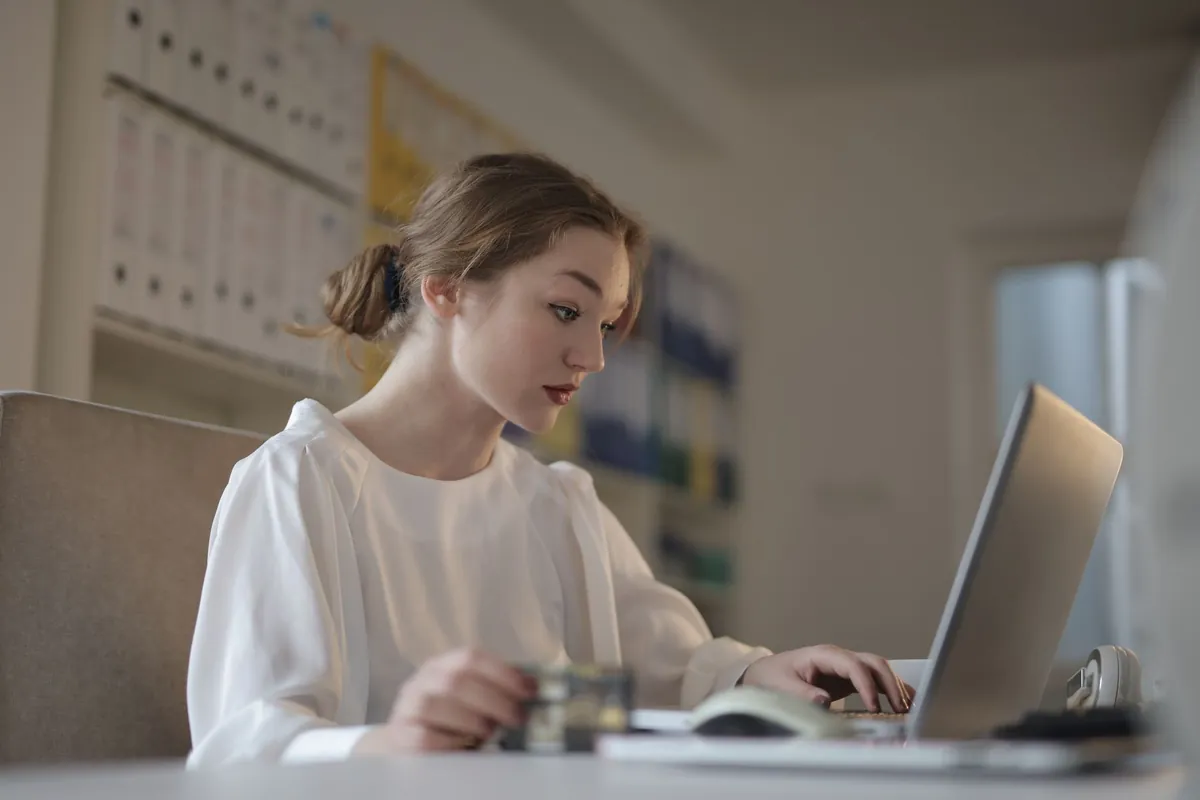 Law firm professionals reviewing cloud-based bookkeeping reports