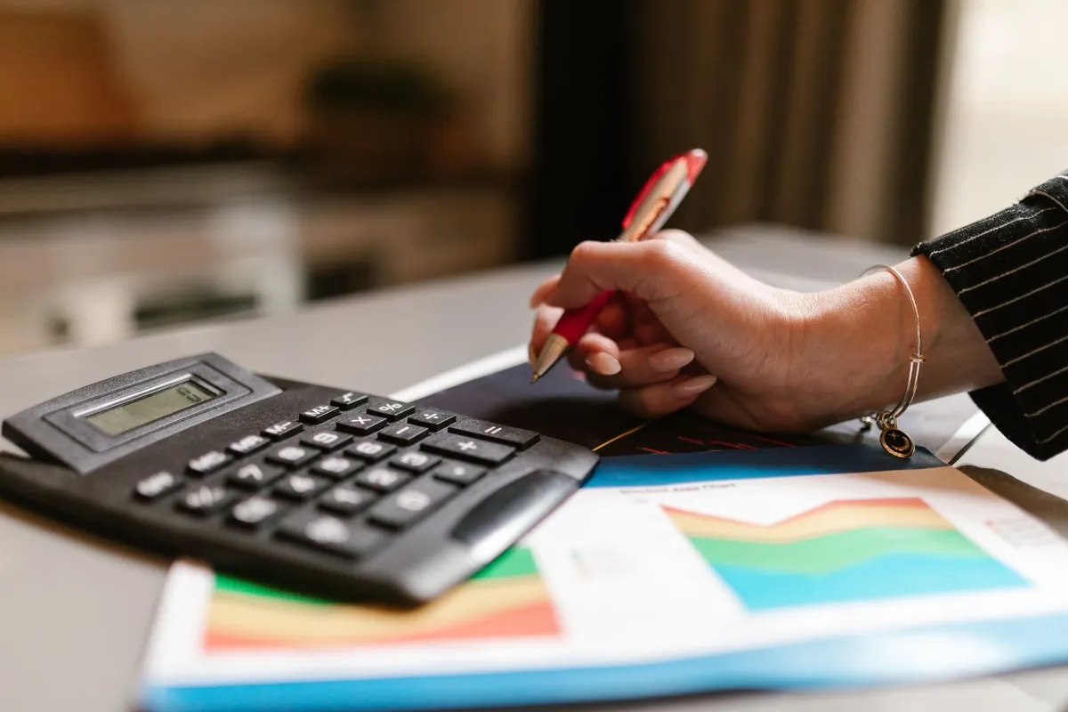 Marketing bookkeeping specialists reviewing agency financial reports