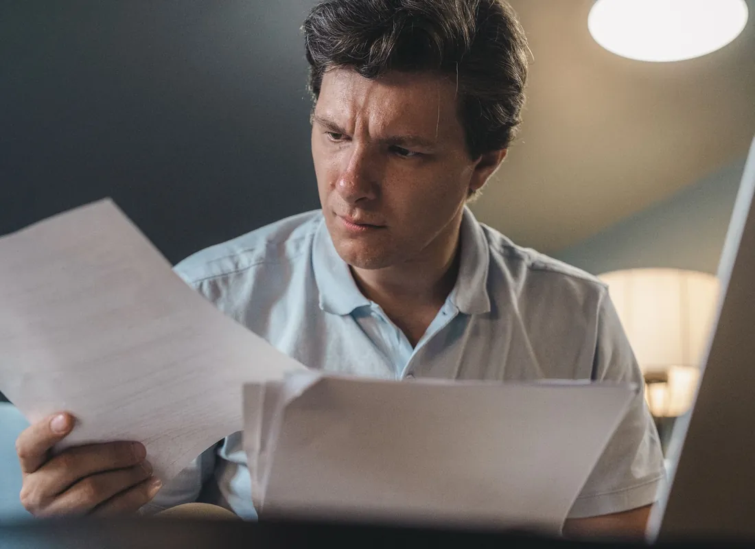 Marketing agency owners reviewing financial documents