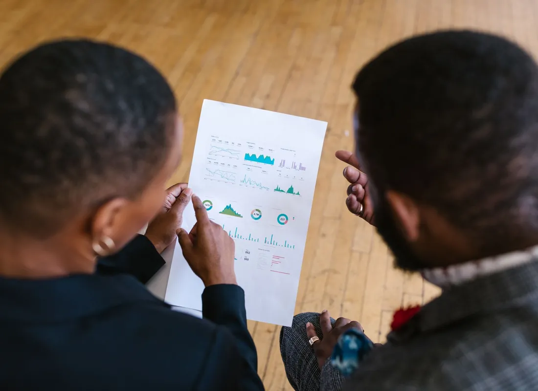 Melbourne business owners reviewing financial documents together
