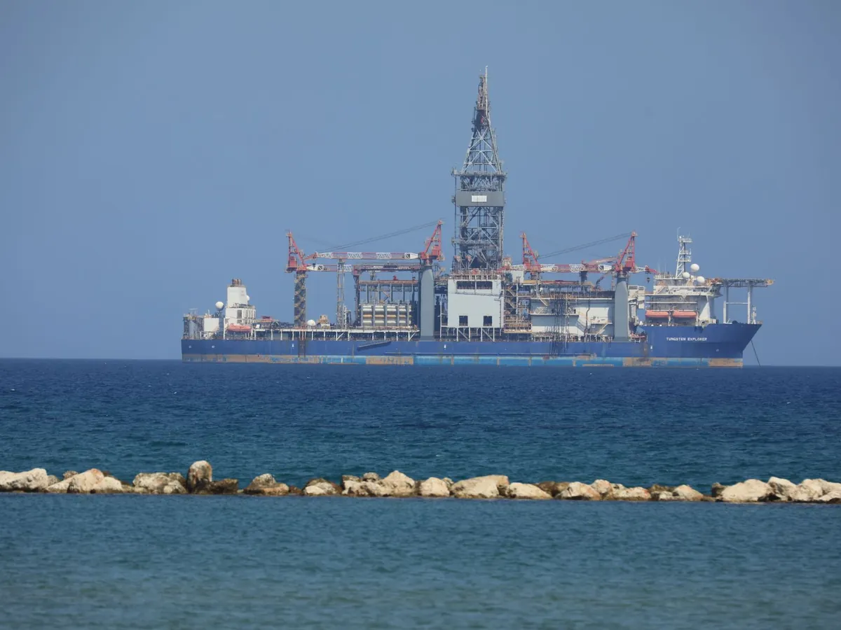 Oil and gas company team reviewing revenue and bookkeeping records