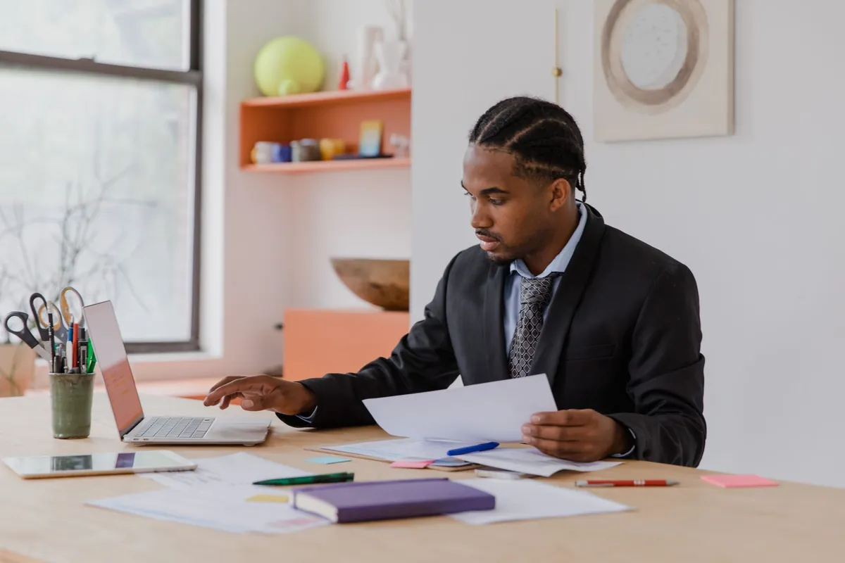 Property management professionals reviewing accounting and bookkeeping reports