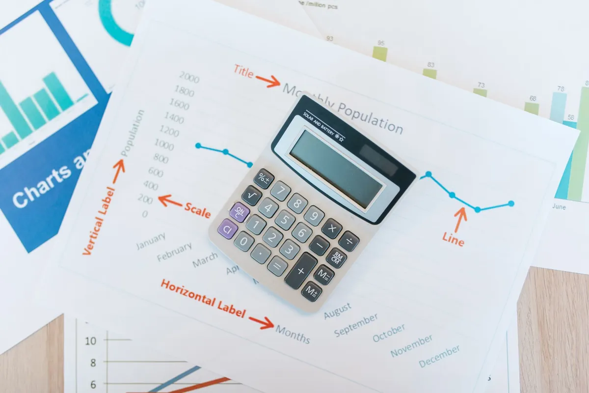 Restaurant professionals reviewing accounting and bookkeeping reports