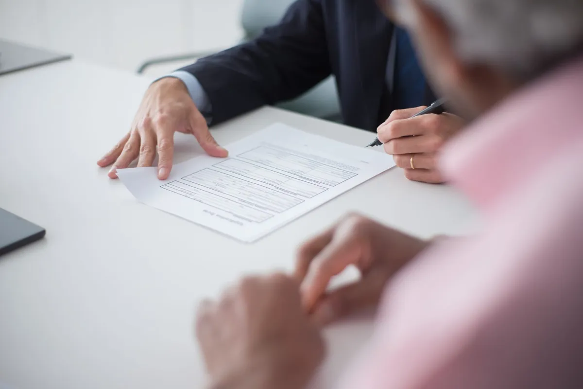 Real estate tax specialists reviewing property investment tax filings