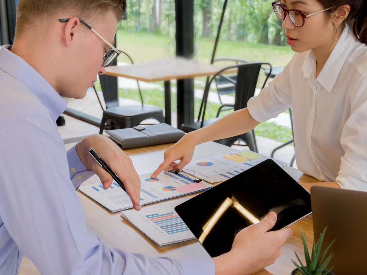 Accounting team reviewing reports