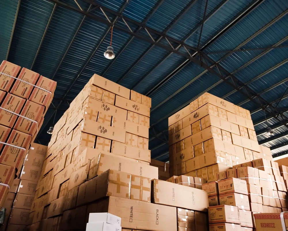 Warehouse shipping boxes stacked